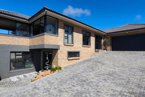 Elegant Coastal Living with Dual-Level Versatility in Island View 

Discover refined comfort in this beautifully maintained ...