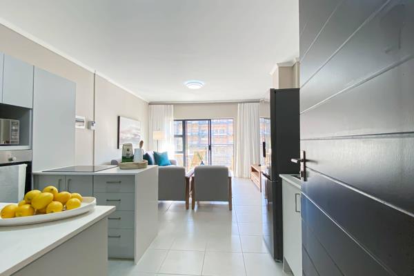 Step into a comfortable one-bedroom ground floor unit.  It has a open-plan living area ...