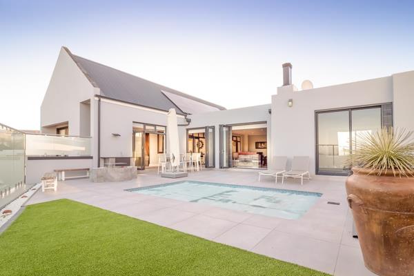 Exclusive sole mandate! Tucked away in a serene cul-de-sac, this immaculate home is ...