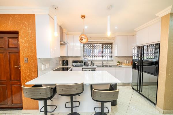 Step into this beautifully designed 3-bedroom, 2-bathroom simplex offering breathtaking views and a seamless open-plan layout. The modern kitchen, featuring sleek white gloss cupboards and ample workspace, flows effortlessly into ...