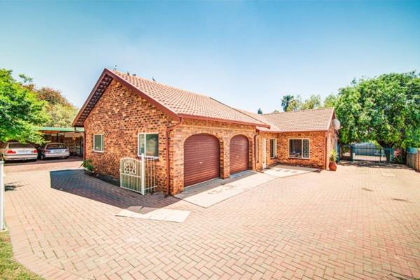 Elegant 4-Bedroom Family Home | Spacious Living | Double Garages &amp; Garden ...