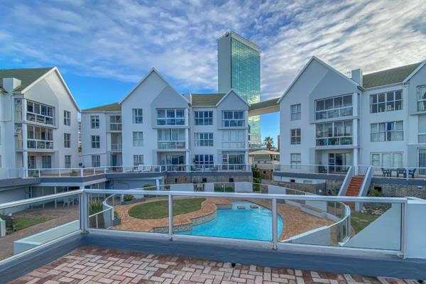 Enjoy the ultimate coastal lifestyle in this secure beachfront apartment, perfectly ...