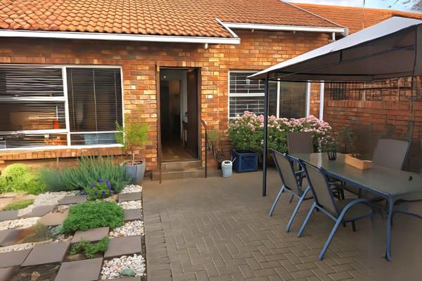 This well-designed, market-ready townhouse offers secure, low-maintenance living in a ...