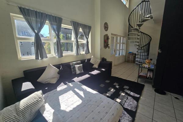 Step into a vibrant blend of comfort and contemporary style with this beautifully ...