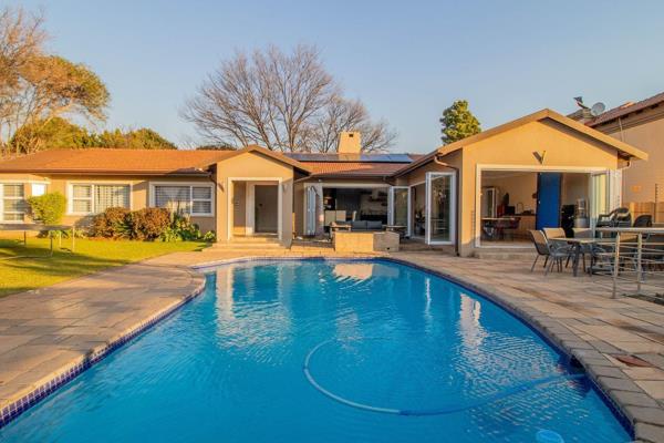Discover this beautifully renovated 5-bedroom, 3-bathroom home nestled on a generous ...