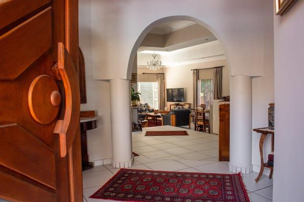 Located in the secure and desirable Woodhill Golf Estate, this beautifully appointed 3-bedroom family home seamlessly blends ...