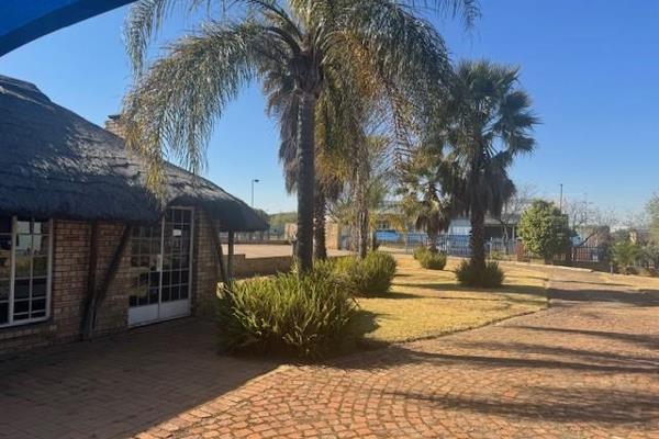 Free standing warehouse, workshop laboratory, offices and showroom on large well ...