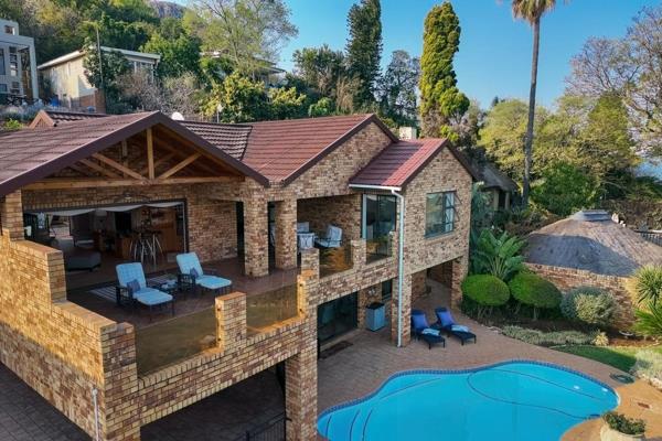 This beautiful home with spectacular views are situated in the lush green sanctuary of ...