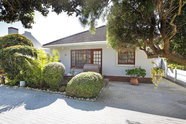 All of the bedrooms have built-in cupboards and the 2nd bedroom has an en-suite bathroom ...