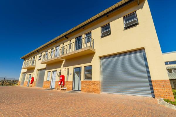 This on-grade unit features a convenient roller shutter door, ample natural light, and ...