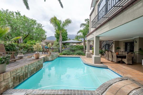 “Experience luxury family living in prestigious Paradyskloof while benefiting from ...