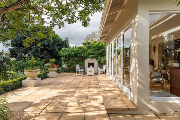 Three-bedroom townhouse in Shortens Country Estate, Ballito. This renovated home includes three bedrooms, two bathrooms, and a double ...