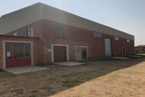 Property Size: 12,383 m² / 1.2383 ha

This versatile property offers a combination of warehouses, storage units, and development ...