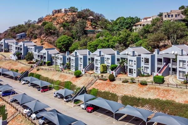 Step into comfort and serenity with this charming ground-floor unit, offering 2 spacious bedrooms, 2 bathrooms, and breathtaking ...
