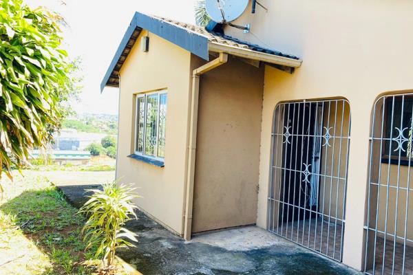 Tucked away from the street and accessed via a private staircase, this delightful 2-bedroom house offers peaceful living with ample ...