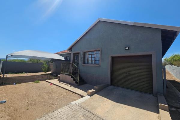Step into a welcoming family home in Burgersfort, where practical living meets comfort. This residence offers three tiled bedrooms with ...