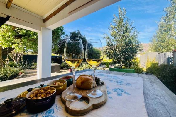 Located on a quiet street in the charming, scenic town of Porterville, this beautifully ...