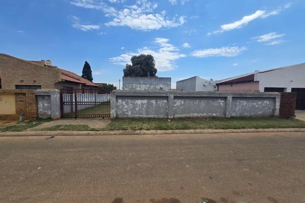 Nestled in Spruit View Katlehong, this compact family home offers a simple, functional ...