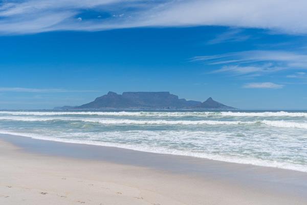 Positioned in one of Bloubergstrand’s most sought-after beachfront locations, this ...