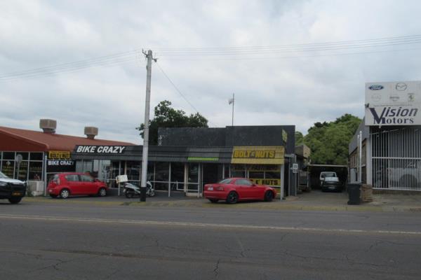 Discover an exceptional investment opportunity featuring a versatile commercial space comprising 2 retail stores, 8 fully equipped ...