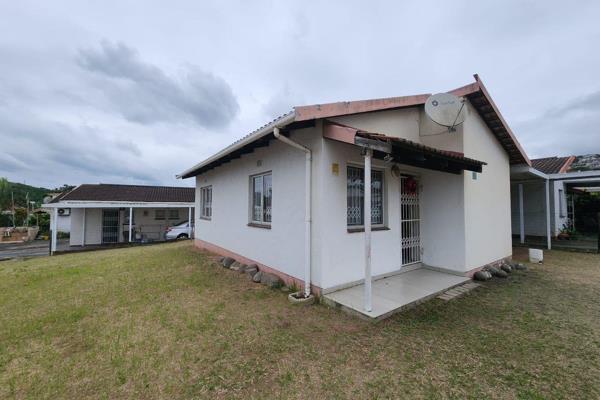 Located within a well-maintained gated community, this neat and secure home offers comfortable complex-style living with the ...