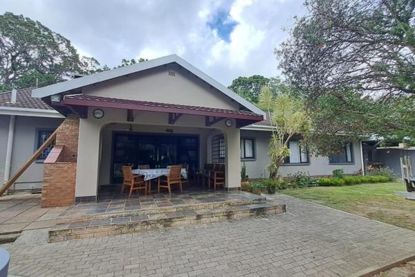 Walking down the paved driveway, step inside to discover a well-appointed interior ...