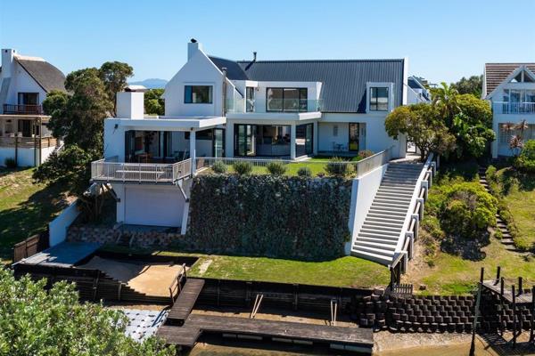 Canal Side Residence Combining Seamless Indoor/Outdoor Entertaining with Flexible Accommodation and Income Potential 

SOLE MANDATE: This extraordinary canal side residence ...