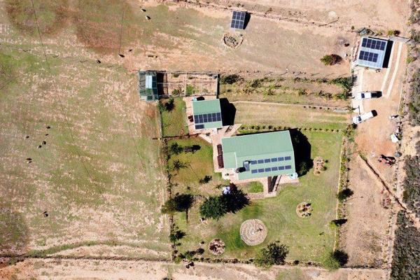 Tucked into a private mountain valley just a few kilometres outside Joubertina, this 25-hectare smallholding offers the kind of setup ...