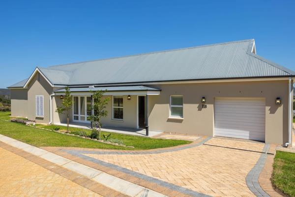 Situated in Knysna Lifestyle Estate, this newly built home offers modern, secure living ...