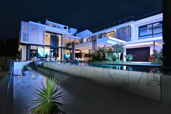 A dramatic expression of modern contemporary design, breath-taking in sheer artistry and design, this extraordinary residence with ...
