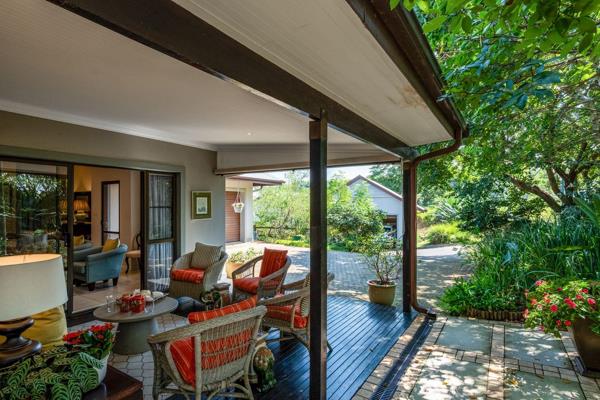 Discover a rare, single-level retreat set in an elevated, private garden oasis within ...