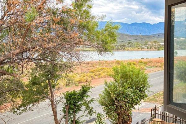 Enjoy beautiful mountain views right from your stoep — this property offers a smart ...