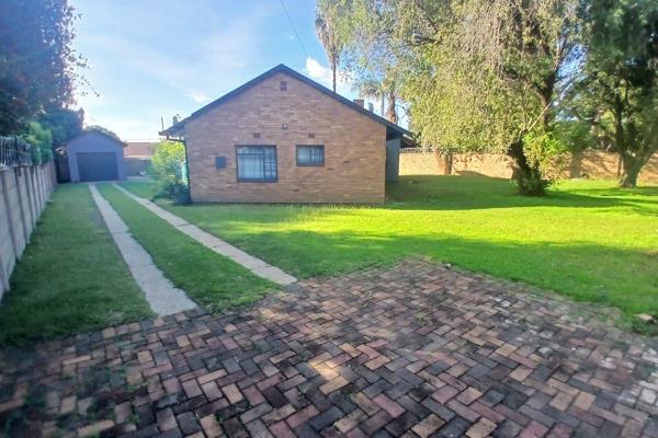 This roomy family home in Witbank Ext 10 offers a practical layout designed for everyday living. The open plan kitchen features granite ...