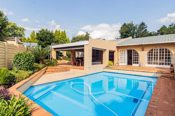 Nestled within a secure, gated, and access-controlled enclave in the highly sought-after ...