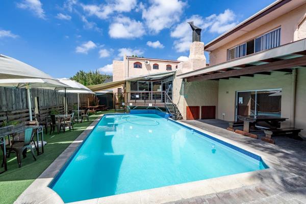 Iconic Income-Generating Guesthouse with Restaurant &amp; Medical/Commercial Potential – High Exposure Location

(CC Sale – No VAT or ...