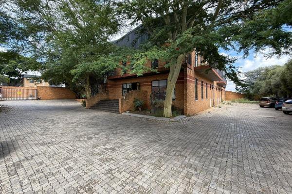This neat and spacious 2,500m2 warehouse for sale in Laser Park offers a versatile ...