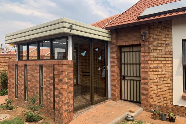 Experience comfortable, secure, and low-maintenance living in this beautifully presented ...