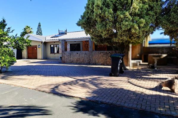 As you enter this beautiful family home, you are welcomed by expansive grounds and a covered veranda that creates a warm and inviting ...