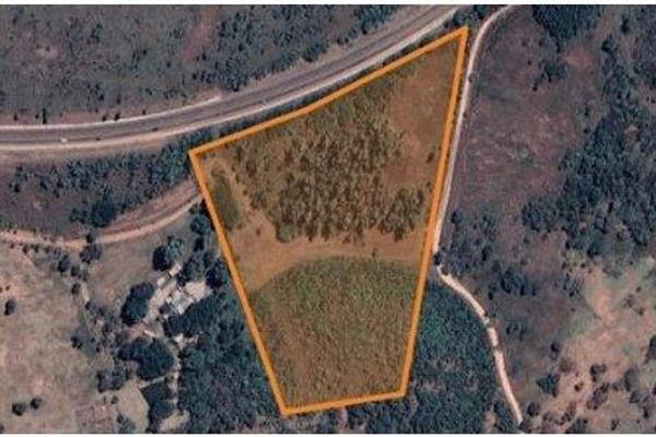 Exceptional 3.7-hectare property ideally located next to the main road, offering excellent visibility and access. This versatile ...