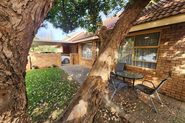Discover refined living in this stylish face brick townhouse with a classic tiled roof, nestled in the sought-after Langenhovenpark ...