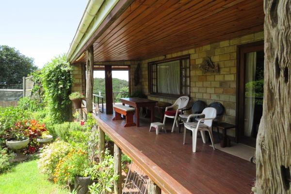 A three bedroom home close to the beach with super views and outside living area that is ...