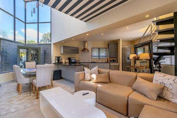 Tucked away in a secure and private setting, this modern duplex townhouse offers the perfect lock-up-and-go lifestyle with stylish ...