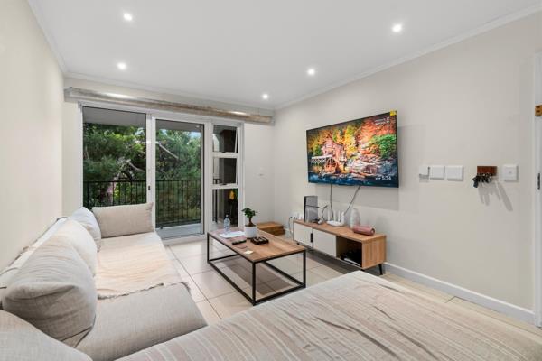 A modern, secure and income-producing apartment with an active lease already in ...