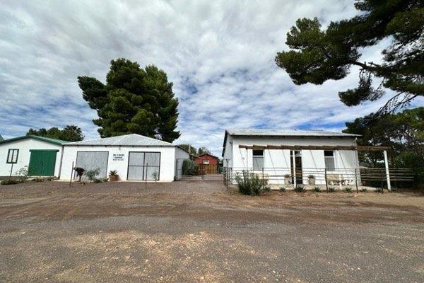 Step into this inviting ±90m² north-facing home, perfectly positioned on a generous 1,269m² plot in town. Boasting 5 ...