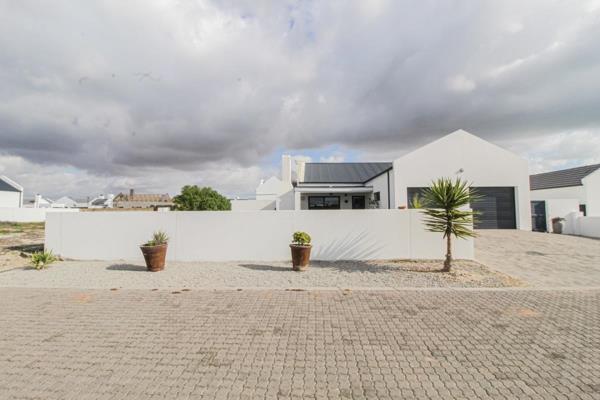 VIEW BY APPOINTMENT ONLY
Modern Coastal Living in Atlantic Sands South Estate  and ndash; Velddrif
Discover this stunning and spacious 3-bedroom home in the highly sought-after ...