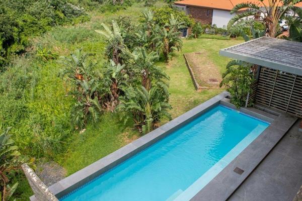 Bright, airy, and modern—this sought-after Zimbali townhouse blends lifestyle with strong investment appeal. Already thriving in the holiday rental pool, it offers three bedrooms (main en suite), a work-from-home space, and ...