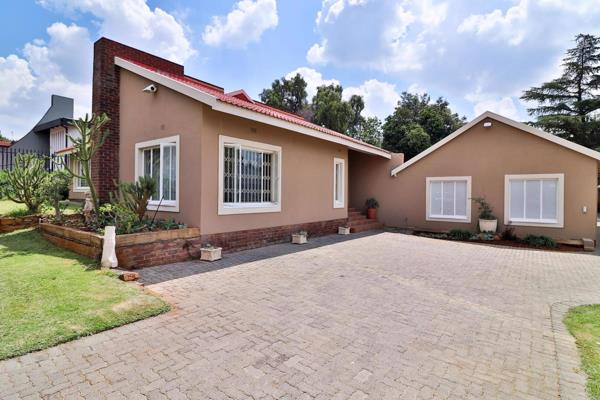 A well maintained free standing house that has been converted into offices, with ...