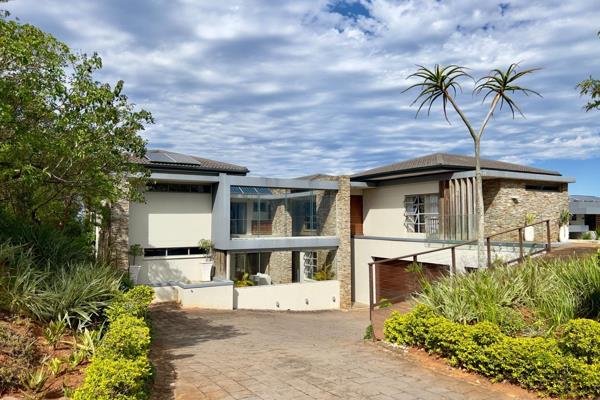 Experience elevated estate living in this magnificent freestanding 4-bedroom residence ...