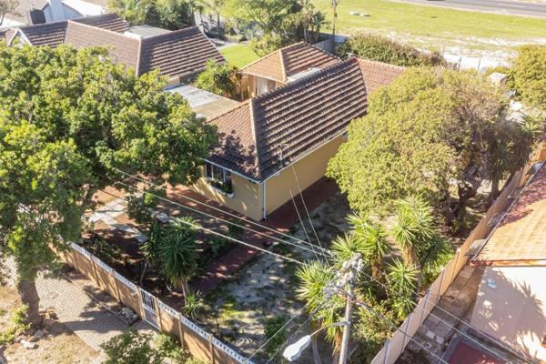 Nestled in leafy Pinelands, this 5-bedroom, 5-bathroom gem offers character and versatility. The property boasts income potential with ...
