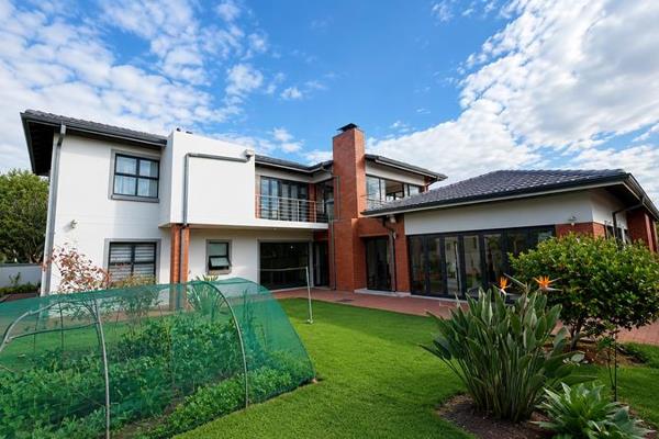 Tucked away in a quiet pocket of Midstream Ridge, this remarkable residence offers the perfect blend of luxury, comfort, and functional ...
